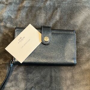 Coach wristlet. Brand new with tags.